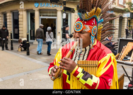 South American street musician in the street of Worcester, Worcestershire, UK Stock Photo