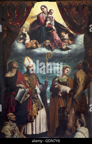 BRESCIA, ITALY - MAY 23, 2016: The painting of Madonna among the saitns in church Chiesa di San Giovanni Evangelista Stock Photo