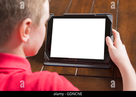 Child holding white tablet PC in hands Stock Photo