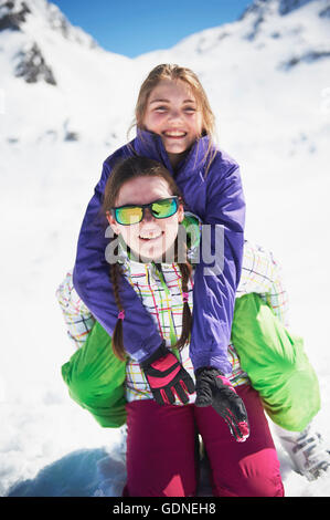 Portrait of two sisters in ski-wear Stock Photo