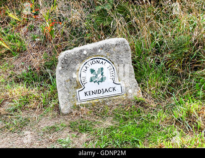 A National Trust omega sign at Kenidjack Cornwall England UK *TAKEN FROM PUBLIC FOOTPATH* Stock Photo