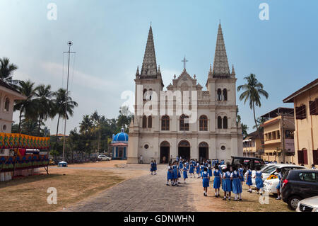 Indian young schoolgirls near the Santa Cruz basilica colonial Church in Fort Kochi. Fort Kochi Stock Photo