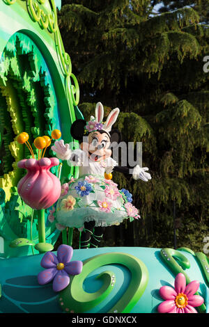Minnie Mouse performing during a parade through Disneyland in Tokyo, Japan Stock Photo