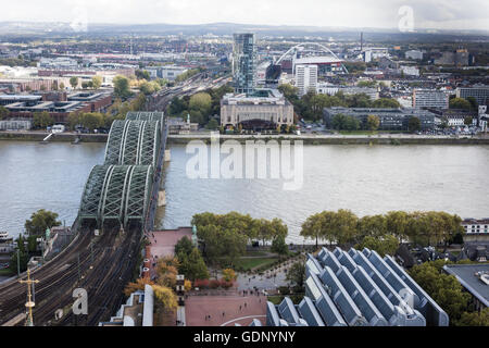 A view towards the east of the Hohenzollern Bridge crossing the River Rhine in Cologne, Germany. Stock Photo