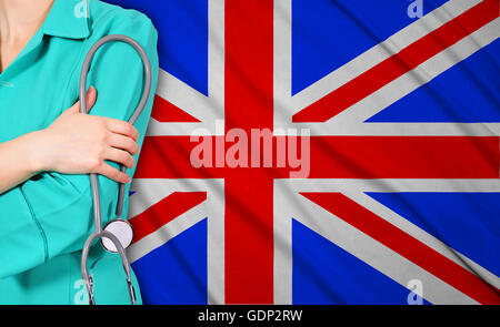 female doctor with stethoscope on britain flag background Stock Photo