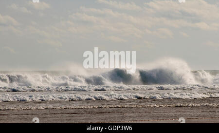 Huge waves at Bethell's Beach in Auckland, New Zealand Stock Photo