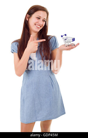 Young woman holding a small shopping cart, isolated Stock Photo