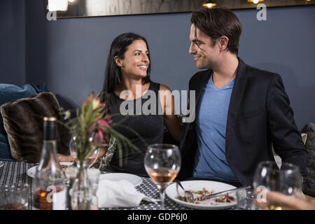 Couple on date dining in restaurant Stock Photo