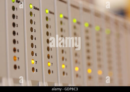 PLC programmable logic controller input/output modules installed in a rack. Selective focus. Stock Photo