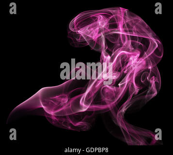 pink smoke on the black background. Stock Photo