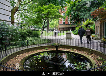 The small green space called 'Postman's Park'  between King Edward Street, Little Britain and Angel Street, near St Paul's. Stock Photo