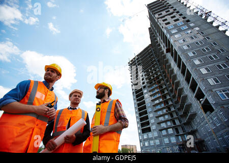 Instructors at construction site Stock Photo