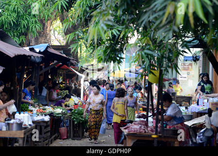 a smal streetmarket in the city of Myeik in the south in Myanmar in Southeastasia. Stock Photo
