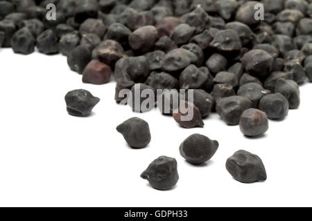 Heap of black Ceci neri chickpeas on white background Stock Photo