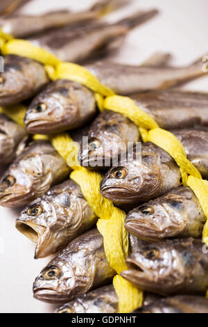 Two Bunches of Dried Corvina - Isolated on White Stock Photo