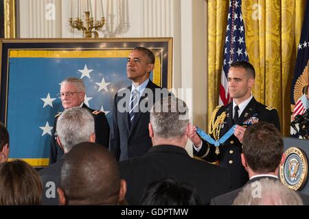 U.S President Barack Obama prepares to present the Medal of Honor to retired U.S. Army Lieutenant Colonel Charles Kettles for conspicuous gallantry during a ceremony in the East Room of the White House July 18, 2016 in Washington, DC. Kettles is credited with saving the lives of 40 soldiers in combat operations near Duc Pho, Vietnam, on May 15, 1967. Stock Photo
