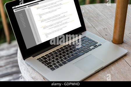 close up of laptop computer on table at hotel Stock Photo