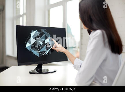 businesswoman with projection on computer Stock Photo