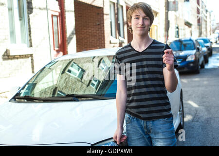 Teenage boy and new driver Stock Photo