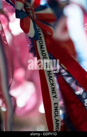 Pink, blue and white satin ribbon bows on wooden background. Scrapbooking  theme Stock Photo - Alamy