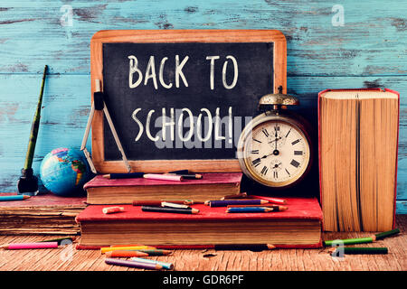 School objects for students. Chalkboard, pencils, crayons and apple Stock  Photo - Alamy