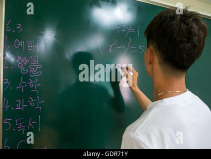 North korean teen defector in yeo-mung alternative school during a math course, National capital area, Seoul, South korea Stock Photo
