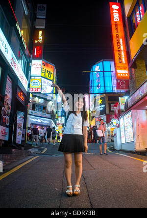 North korean teen defector in the streets of gangnam, National capital area, Seoul, South korea Stock Photo