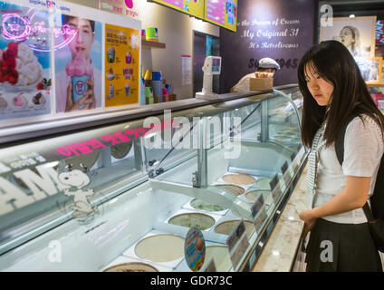 North korean teen defector in an ice cream shop, National capital area, Seoul, South korea Stock Photo