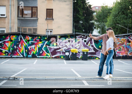 A couple making a selfie @ Flow festival, Tobacna mesto, Ljubljana, Slovenia,  Europe, 2015 Stock Photo - Alamy