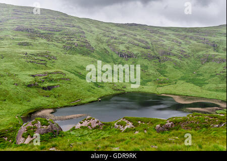 Lake in the grounds of Gleninchaquin Park, Kenmare, Kerry, Ireland. Stock Photo