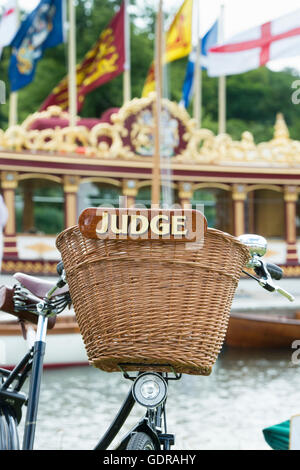 Judges bicycle with wicker basket at the Thames Traditional Boat Festival, Fawley Meadows, Henley On Thames, Oxfordshire, England Stock Photo