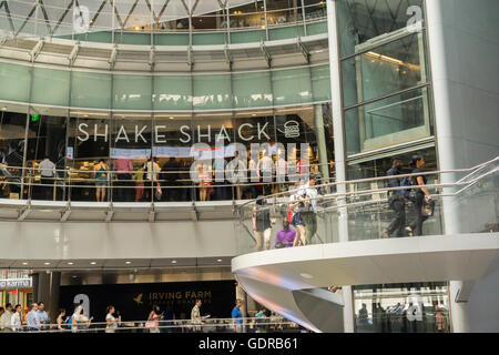 Crowds of drooling lunch time burger lovers line up at the newly opened Shake Shack restaurant in the Fulton Center in Lower Manhattan in New York on Monday, July 18, 2016. (© Richard B. Levine) Stock Photo