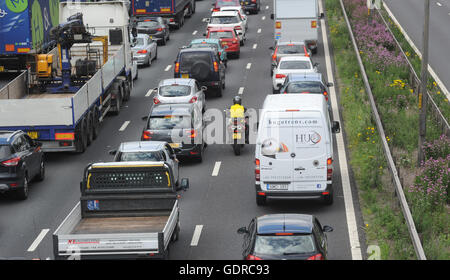 TRAFFIC QUEUES AND  FILTERING MOTORCYCLIST ON THE NORTHBOUND M6 MOTORWAY NEAR STAFFORD RE SMART MOTORWAYS CONGESTION ROAD UK Stock Photo