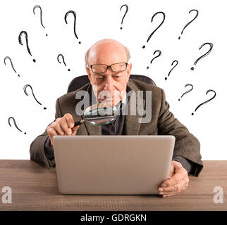 Difficult technology for a man elderly Stock Photo