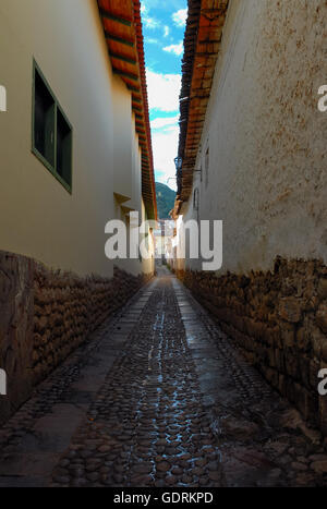 Cobbled alley Cusco and ancient Inca walls, Peru