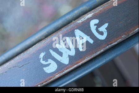 A park bench, with alot of sawg! Stock Photo