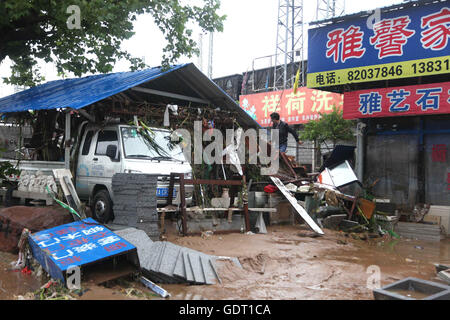 Jingxing, China's Hebei Province. 20th July, 2016. Photo taken on July 20, 2016 shows a waterlogged residential area in Jingxing County of Shijiazhuang City, north China's Hebei Province, July 20, 2016. Continuous heavy rain hit north China's Hebei Province for three days, causing 14 people dead, 72 missing and affecting 1.995 million people. Credit:  Wang Baolong/Xinhua/Alamy Live News Stock Photo