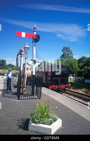 Steam loco approaches Totnes Littlehempston station on the 'South Devon Railway', UK Stock Photo