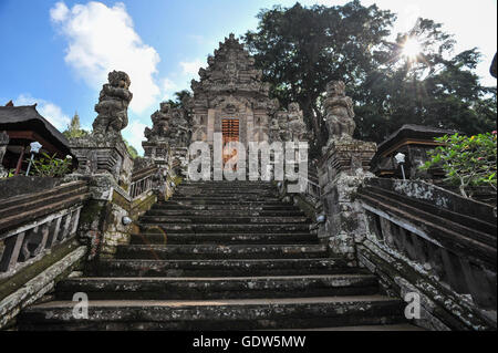 Sunset from the gates of a Ancient Balinesse Hindu Temple in Bali, Indonesia Stock Photo