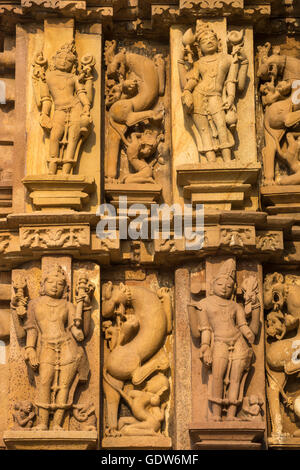 Intricate stone Sculpture detail at a temple, Khajuraho, Chhatarpur District, Madhya Pradesh, India Stock Photo