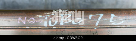 Bench with the words, Turbo 75 gratified, on it Stock Photo