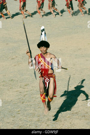 The image of Naga Tribe man performing  at Horbill festival, Nagaland, India Stock Photo