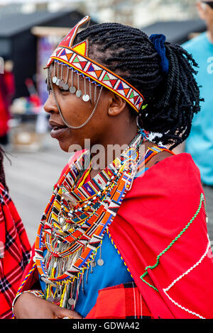 An African Woman Dressed In Traditional Costume On Hastings Pier During The Annual Pirate Day Festival, Hastings, Sussex, UK Stock Photo