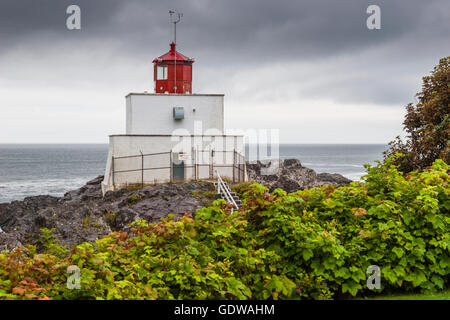 Amphitrite Point Lighthouse at Ucluelet on the West Coast of Vancouver Island, British Columbia. Active and staffed. Stock Photo