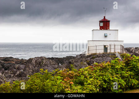 Amphitrite Point Lighthouse at Ucluelet on the West Coast of Vancouver Island, British Columbia. Active and staffed. Stock Photo