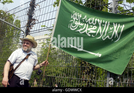 green flag with white arabic writing