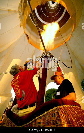 Malcolm Forbes hot inflating the 215 tall 'Minar' special shape hot air balloon at the Chateau Balleroy in Normandy, France. Stock Photo