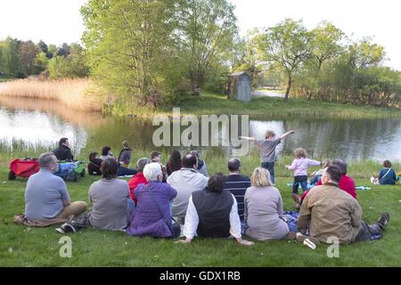 Families with their children at a lake in Britzer Garten, Berlin, Germany, 2014 Stock Photo