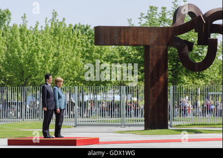 Japanese Prime Minister Shinzo Abe and German Chancellor Angela Merkel at the Chancellery in Berlin, Germany, 2014 Stock Photo