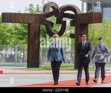 German Chancellor Angela Merkel with Japanese Prime Minister Shinzo Abe at the Chancellery in Berlin, Germany, 2014 Stock Photo